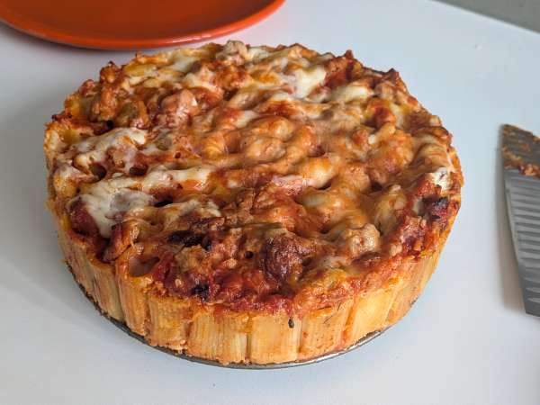 Pečen timballo iz rigatoni s klobaso, bešamelom in mozzarello - Priprava korak 14